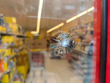 Bursa'da markete pompalı tüfekle saldırı