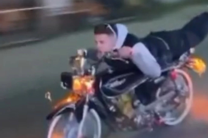 Bursa'da motosikleti yatarak kullanan sürücü 200 bin TL ceza yedi