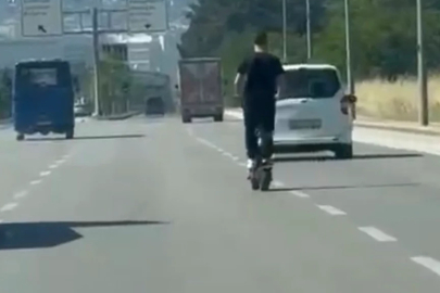Bursa'da elektrikli scooter üzerinde tehlikeli yolculuk