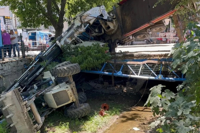 Bursa'da vinç aracın üzerine devrildi, kepçe dereye uçtu!